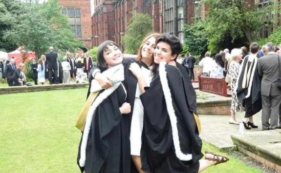 Bridget on graduation day with friends.