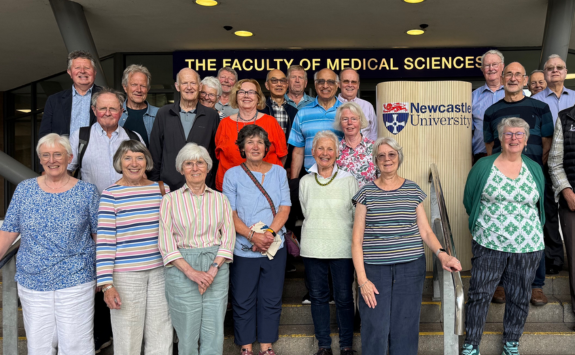 Some alumni from the Medical School Class of 1975 reuniting on campus