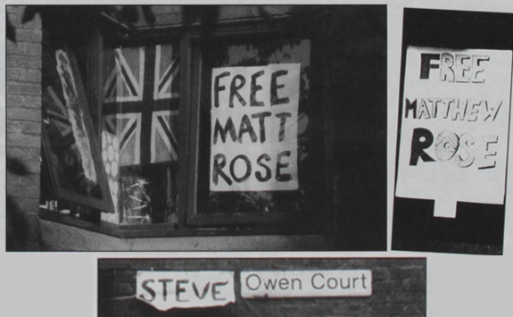 A number of posters in windows and on signage at Ricky Road relating to an Eastenders storyline at the time. 