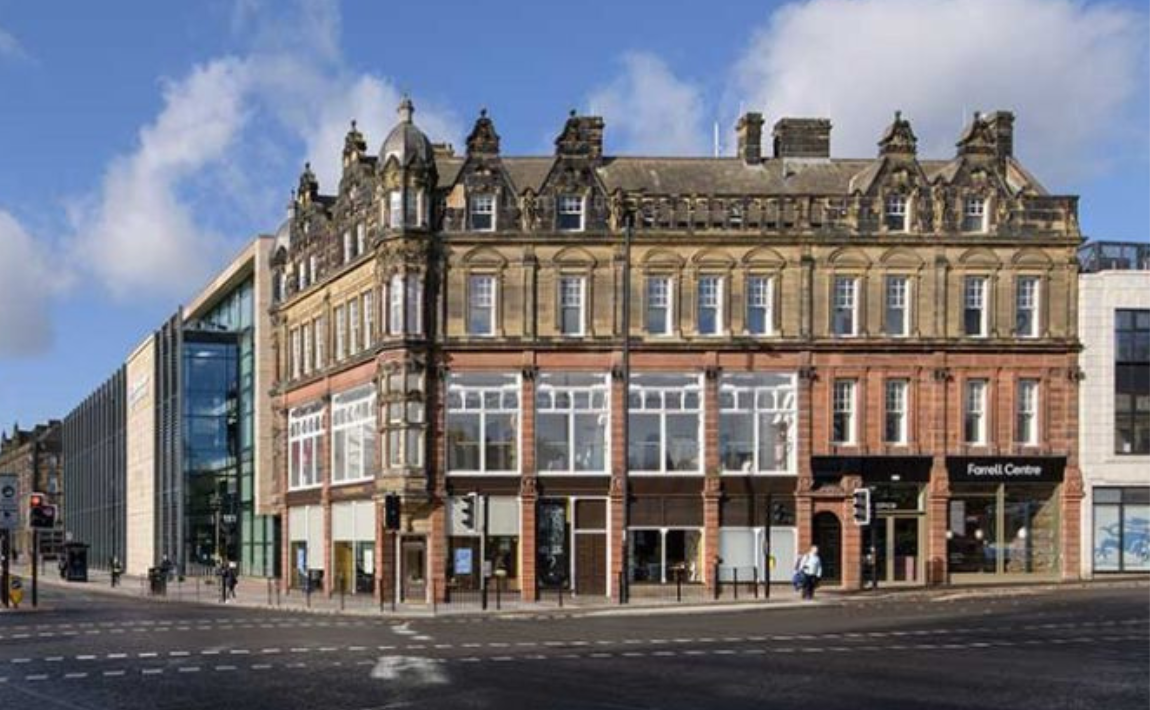 Exterior of Claremont Buildings under a blue sky
