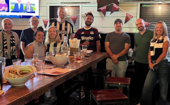 Alumni cheering on NUFC against Arsenal in Washington DC