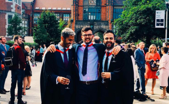 Will in front of the Arches with two friends on graduation day