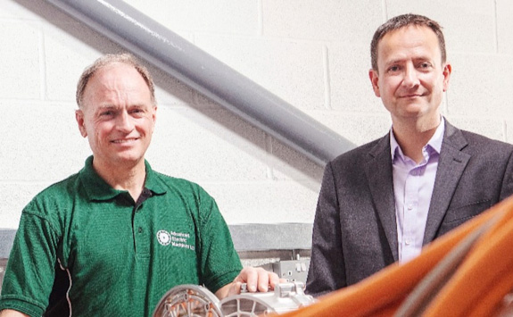 Founders of Advanced Electric Machines pose together.