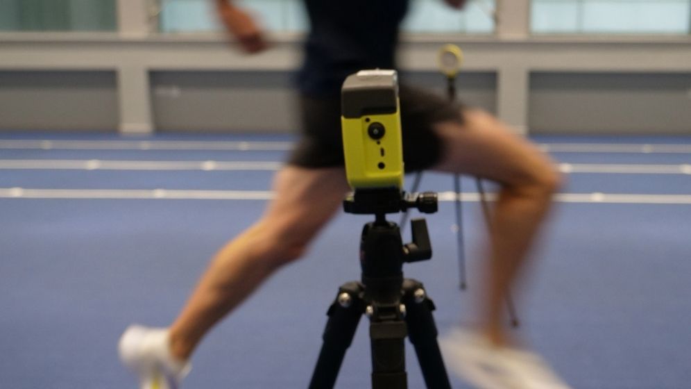 Motion-capture equipment positioned alongside an instrumented running track in Newcastle University's biomechanics and gait laboratory, where advanced movement analysis technology is used to assess human performance and biomechanics.
