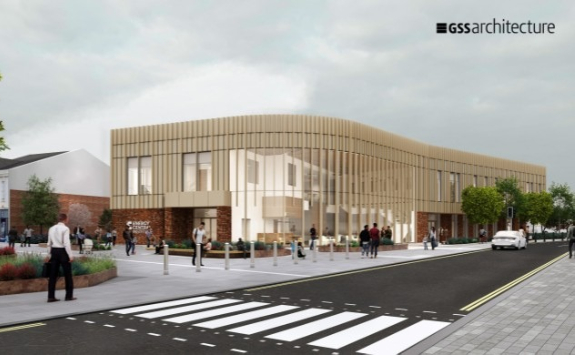 A CGI of the Energy Central Institute being built in Blyth. The building is two stories. The ground floor is built from red brick. The upper floor is clad with a light coloured material. The corner of the building facing the camera is a large glass façade.