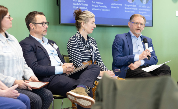 Male speaker contributes to a panel discussion at the Responsible Futures Skills Lab alongside fellow panellists.
