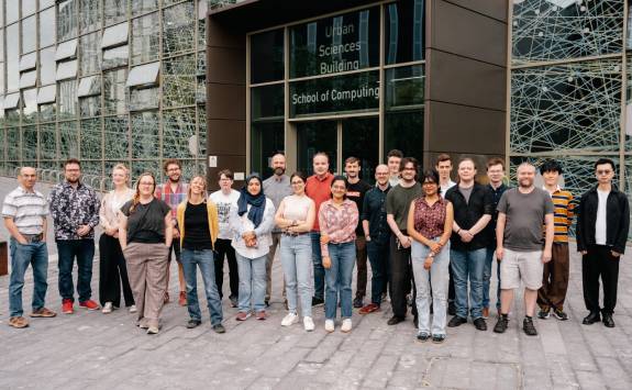Three members of the Open Lab Group at a digital conference.