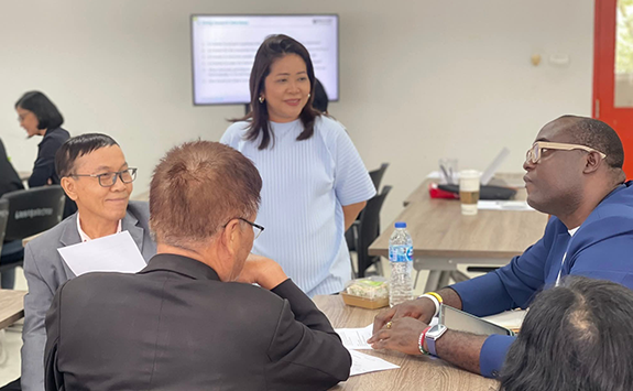 Colleagues working together at a workshop