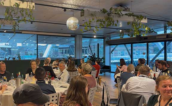 Guests sit at the International second language conference