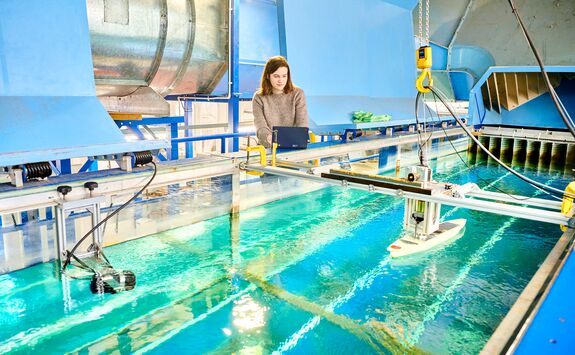 A student conducting an experiment in our Hydrodynamics lab.