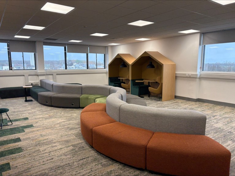 New layout of the Glen study space showing a different view of the snake sofa and two study huts