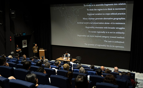 Presenter at a conference 