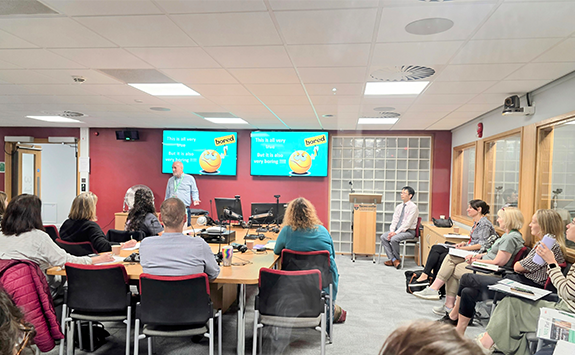 Event attendees watching a presentation