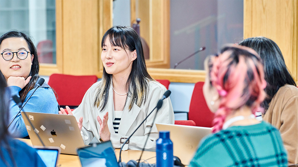 Students listening to their lecturer in the Interpreting Suite