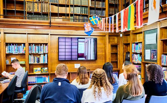 Students in the Language Research Centre watching a film