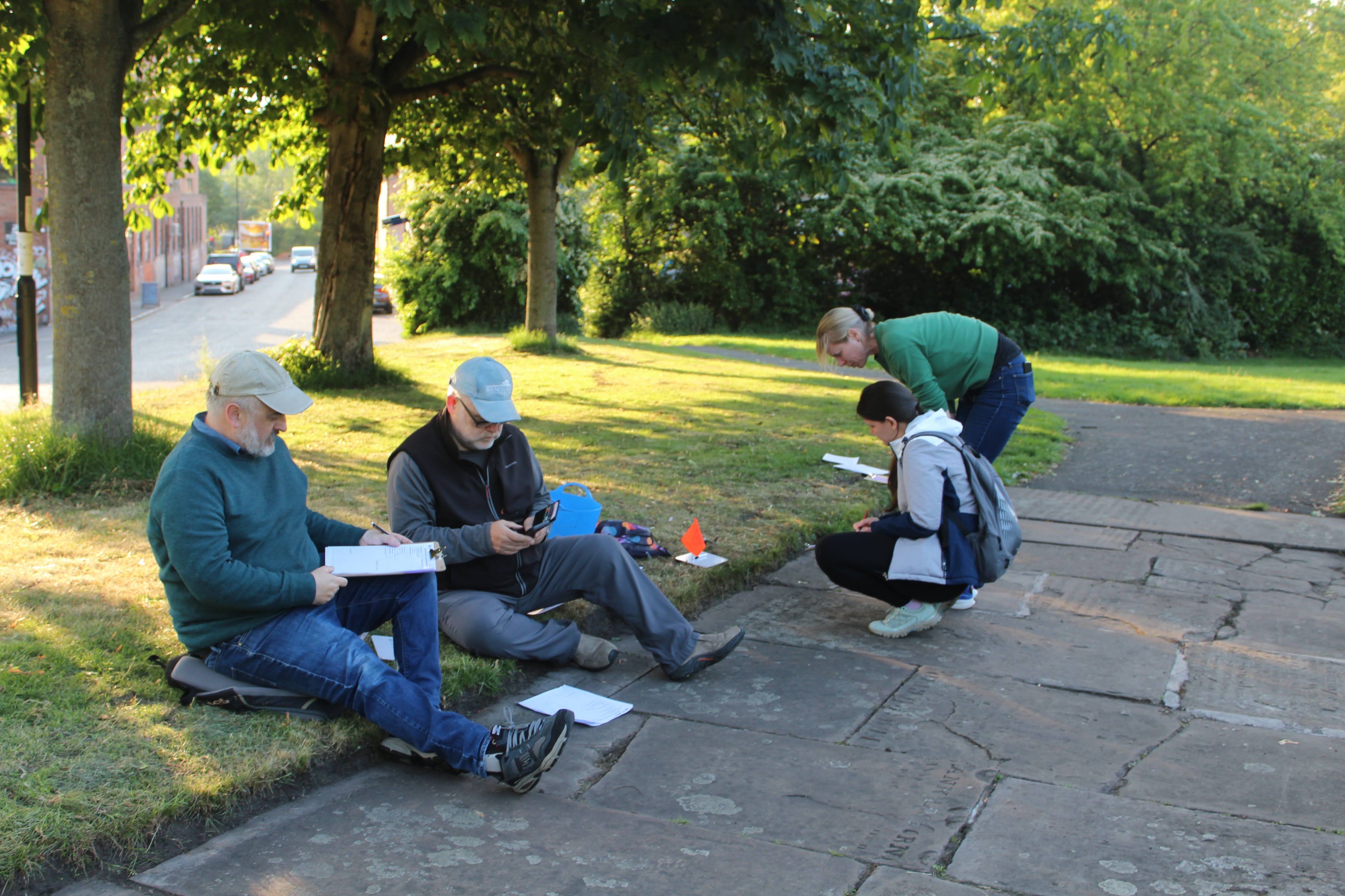 Group of people working in the field