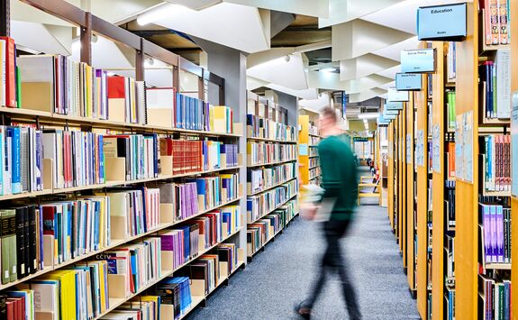 A library interior with labelLed bookshelves, including an 