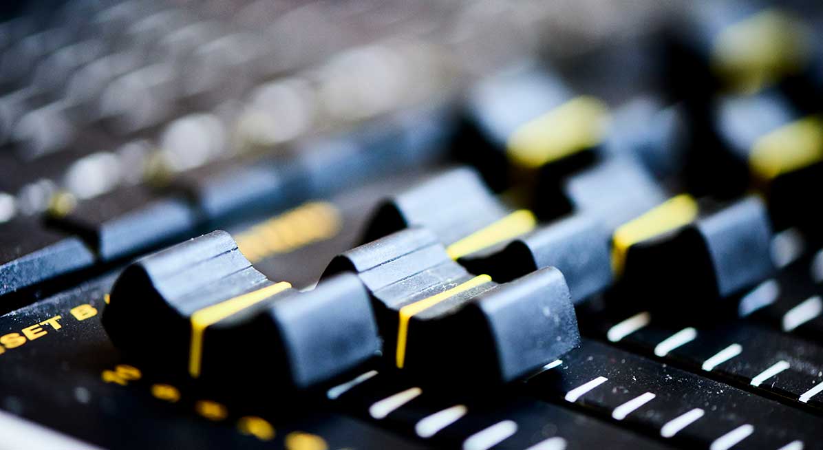 A macro photo of an audio mixing desk - photo credit John Donoghue