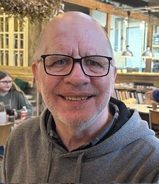 PhD student smiling