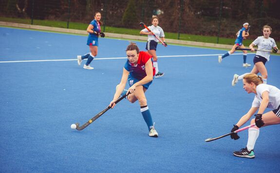 Students playing hockey