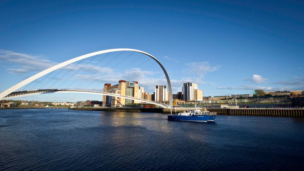 Research Vessel Princess Royal passing under the Millennium Bridge.
